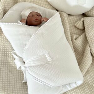 Nid d'ange / Couverture avec pompons